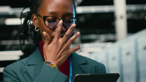 Futureproofing network, smile closeup and pleased female engineer in data center Stock Footage 329452025