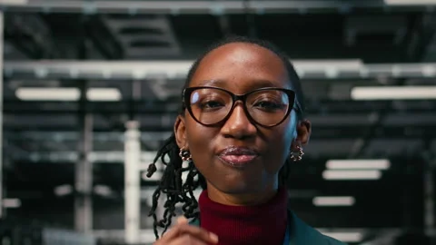 Futureproofing network, smile closeup and pleased female engineer in data center Stock Footage 329714687