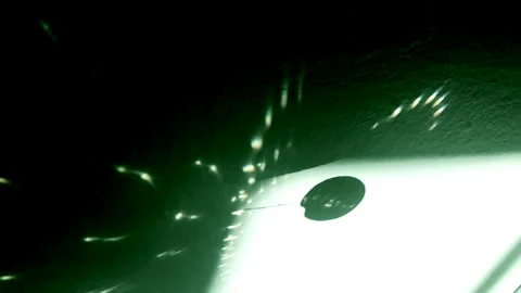 Futuristic Abstractions: Moving Dots and Shapes in a Dreamlike Green Glow Stock Footage 302946913