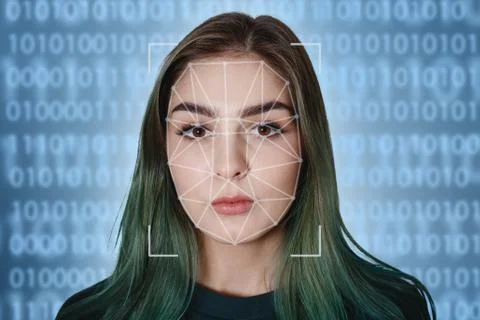 Futuristic and technological scanning of the face of a beautiful woman for fa Stock Photos