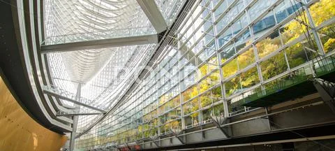 Futuristic architecture interior of tokyo international forum Stock Photos