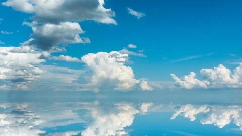 Futuristic background consisting of Time lapse clip of white fluffy clouds over Stock Footage 93860594