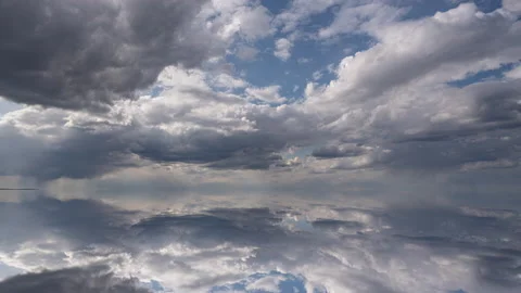Futuristic background consisting of Time lapse clip of white fluffy clouds over Stock Footage 195653842