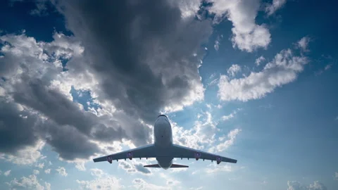 Futuristic background consisting of Time lapse clip of white fluffy clouds over Stock Footage 246642770