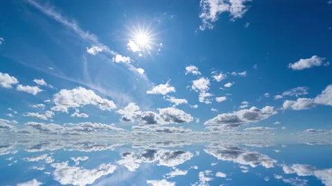 Futuristic background consisting of Time lapse clip of white fluffy clouds over Stock Footage 254538704