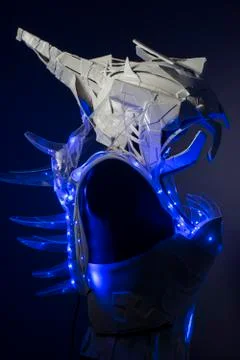 Futuristic, bionic armor with blue LED lights and plastic materials Stock Photos