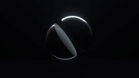 Futuristic black ball split in half spinning Stock Footage
