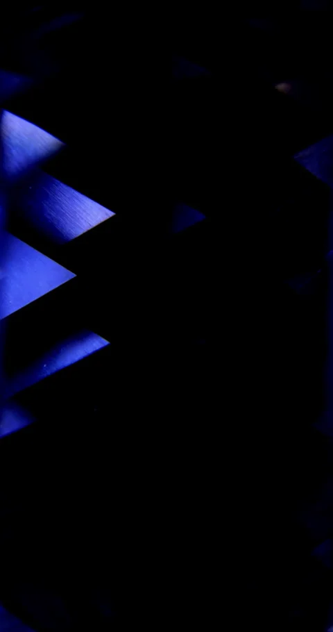 Futuristic blue geometric light animation with glowing triangular shapes Stock Footage 344970288