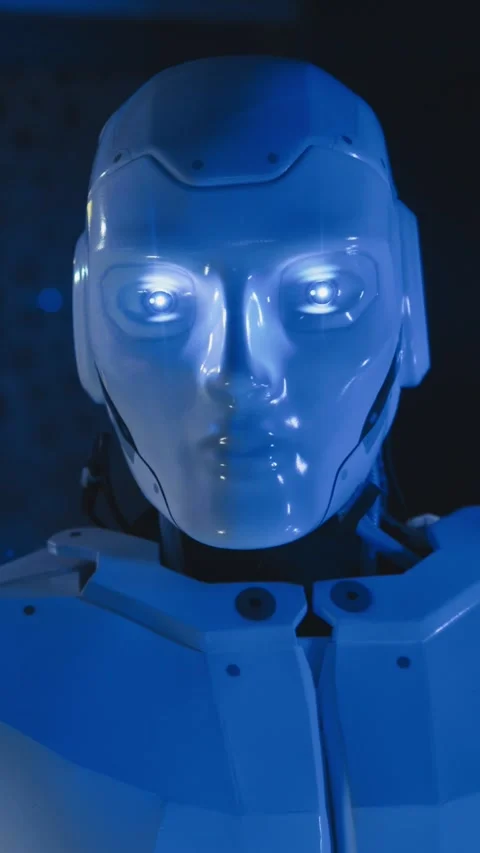 A Futuristic Blue Robot Head Featuring Strikingly Illuminated Design Elements Stock Footage 316523659