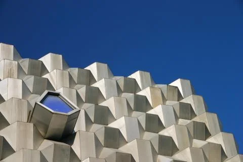 Futuristic building with small window Stock Photos