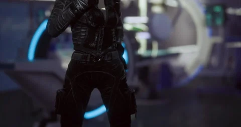 Futuristic character standing in a high tech environment with glowing elements Stock Footage 305697842