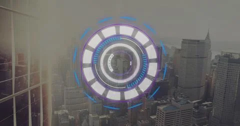 Futuristic circular interface with concentric rings hovering over hazy city Photos