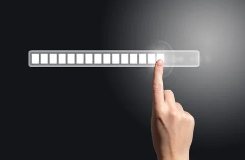 Futuristic concept of progress and innovation with a hand touching a digital Fotos de archivo