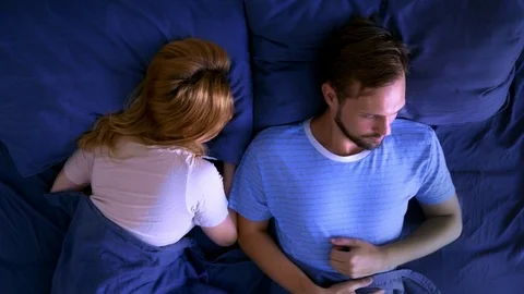 Futuristic concept of smart gadgets. smart home, smart bed, man lying in bed Vídeo Stock 103518412