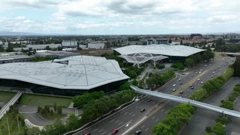 Futuristic corporate NVIDIA Campus with geometric faceted roof buildings beside Stock Footage 336450844