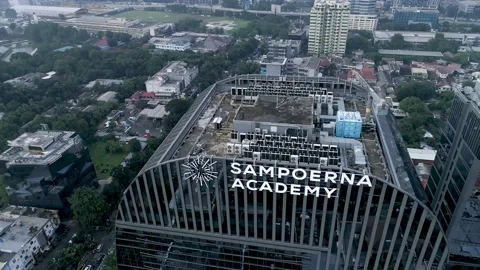 Futuristic Design of Sampoerna Academy Building and Jakarta Cityscape Stock Footage 168955876