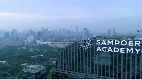 Futuristic Design of Sampoerna Academy Building and Jakarta Cityscape Stock Footage 168955966