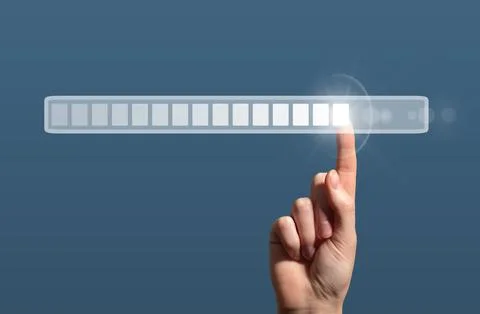 Futuristic digital interface showing a hand interacting with a loading bar th Stock Photos