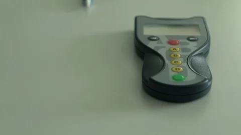 Futuristic electronic remote control case with buttons to control house devices. Video stock 119364563