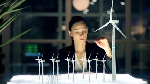 Futuristic Female Engineer Designs in 3D Field with Wind Turbines. Woman Use Stock Footage 150101312