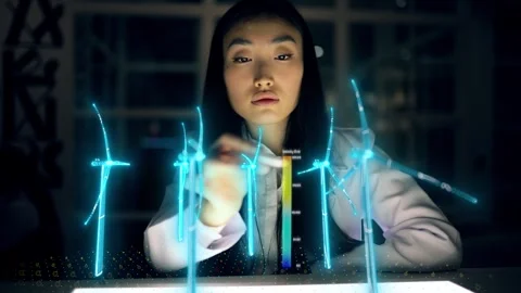 Futuristic Female Engineer Designs in 3D Field with Wind Turbines. Asian Woman Stock Footage 240564547