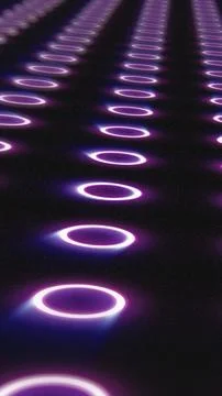 Futuristic glowing violet rings aligned in perspective on a dark surface, for Stock Illustration