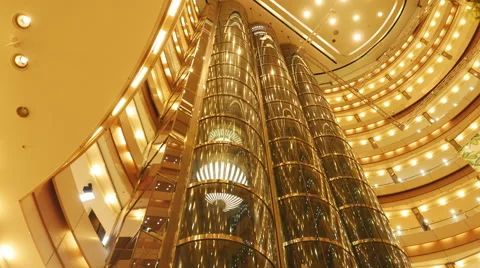 Futuristic, gold-colored elevator Stock Footage 64672669