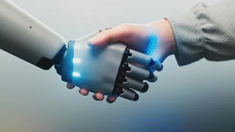 Futuristic Handshake Between Human and Robot Stock Photos