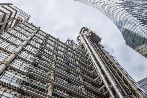 Futuristic high tech office tower with exposed pipes and lifts Stock Photos