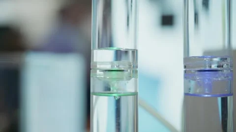Futuristic hydrogen production experiment featuring blue and green color coded Video stock 335314846