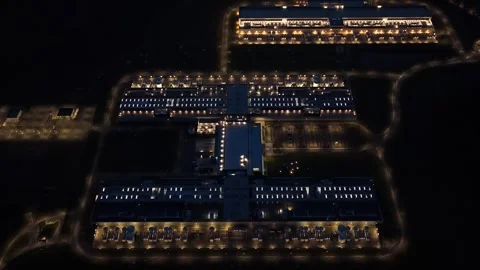 Futuristic IT infrastructure hub illuminated in Odense at night. Stock Footage 318620544