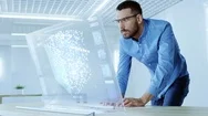 In The Futuristic Laboratory Creative Engineer Works On The Transparent Computer Stock Footage
