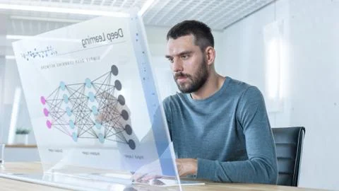 In the Futuristic Laboratory Creative Engineer Works on the Transparent Computer Stock Photos