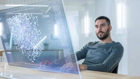 In the Futuristic Laboratory Creative Engineer Works on the Transparent Computer Stock Photos