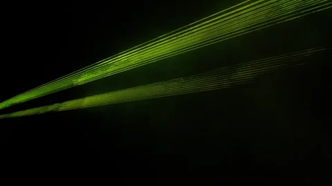 Futuristic laser beams dynamically crossing in a vibrant, abstract display of Stock Footage 292111682