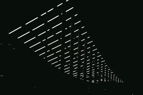 Futuristic light pattern on dark background. Stock Photos