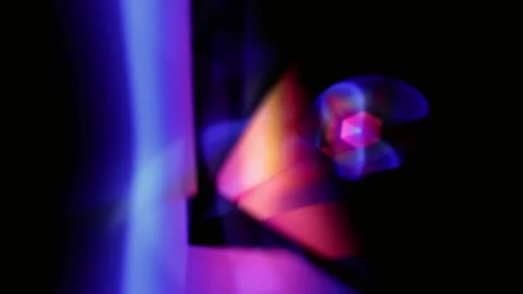 Futuristic liquid bubble floating in neon light. Vibrant colored droplet 스톡 동영상 340025322