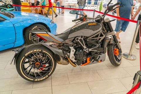 A futuristic-looking motorcycle with an angular design, made of lightweight.. Stock Photos
