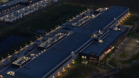 Futuristic Meta data center illuminated against evening sky. Stock Footage 318620455