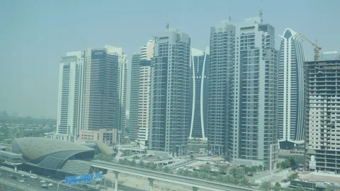 Futuristic metro station installed over a wide highway in Dunai in summer Stock-Footage 92377959
