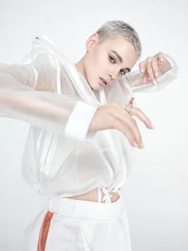 Futuristic model gesturing with hands Stock Photos
