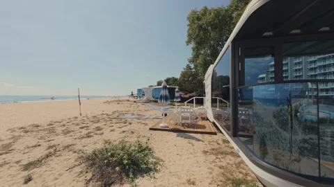 Futuristic Modern Capsule House on Sandy Beach Near the Sea Horizon Stock Footage 346691502