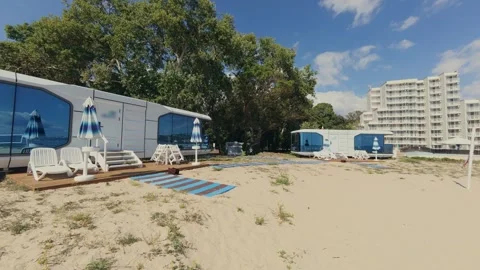 Futuristic Modern Capsule House on Sandy Beach Near the Sea Horizon Stock Footage 346692071