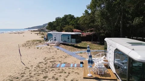 Futuristic Modern Capsule House on Sandy Beach Near the Sea Horizon Stock Footage 346700532