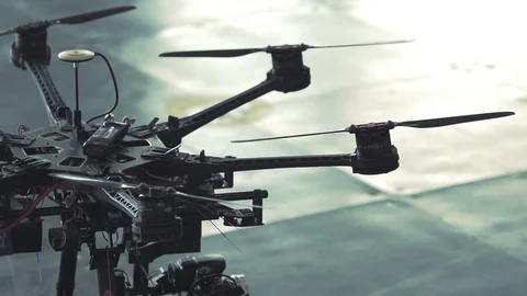 Futuristic octocopter drone blades spin up to speed SLOW MOTION Stock Footage 106570131