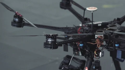 Futuristic octocopter drone prepares for take off Stock Footage 106570038