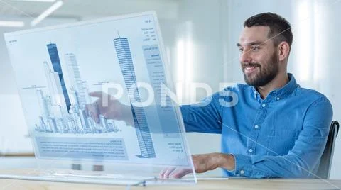 In the Futuristic Office Male Architects Works on the Transparent Computer Stock Photos