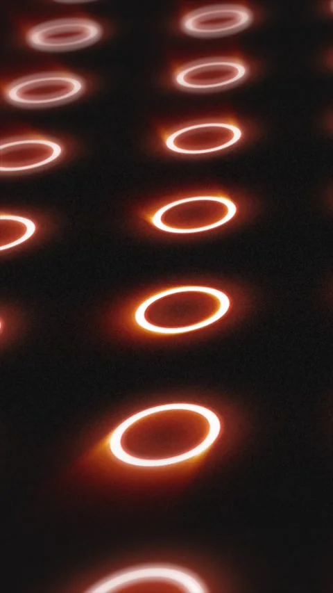 Futuristic pattern of glowing orange rings on dark surface with depth and s.. Stock Footage 328159811