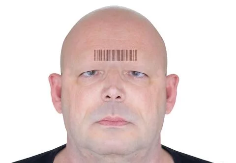 Futuristic rendering of a man's face with a QR code on his forehead. Conceptual  Stock Photos