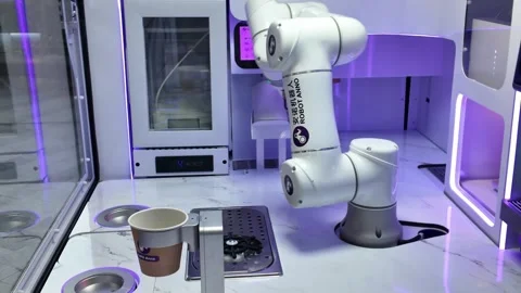 Futuristic Robot Arm Serving Coffee in a Shenzhen Cafe Video stock 323083868
